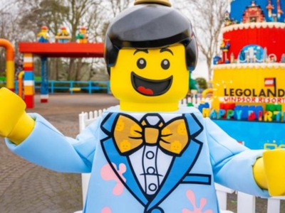 Family enjoying summer theme park fun